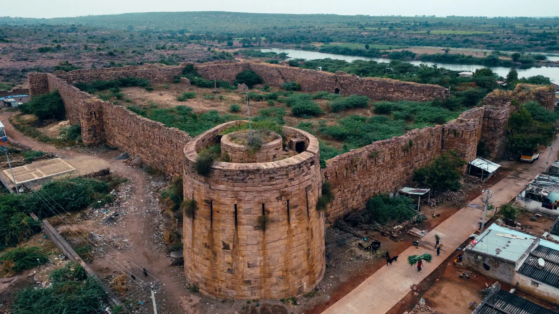 The great circular bastion of Mudalkavi fort, with the river beyond